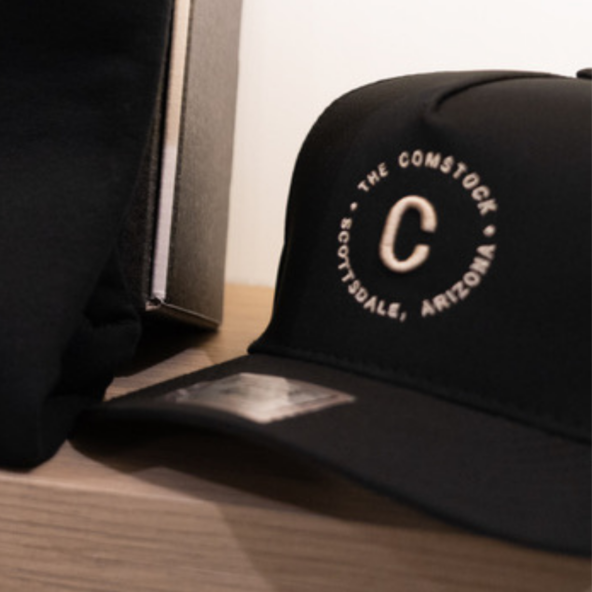 Original Comstock Black Circle Logo Hat